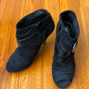 Peep toe booties, suede and leather straps.